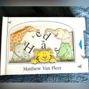 Mathew Van Fleet book with moving parts in fair used condition, has ripped pages